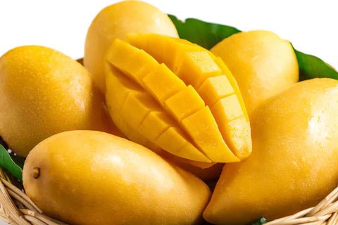 Ripe Alphonso mango from Flavour World SA displayed in a close-up image showcasing its vibrant orange skin and fresh appearance.