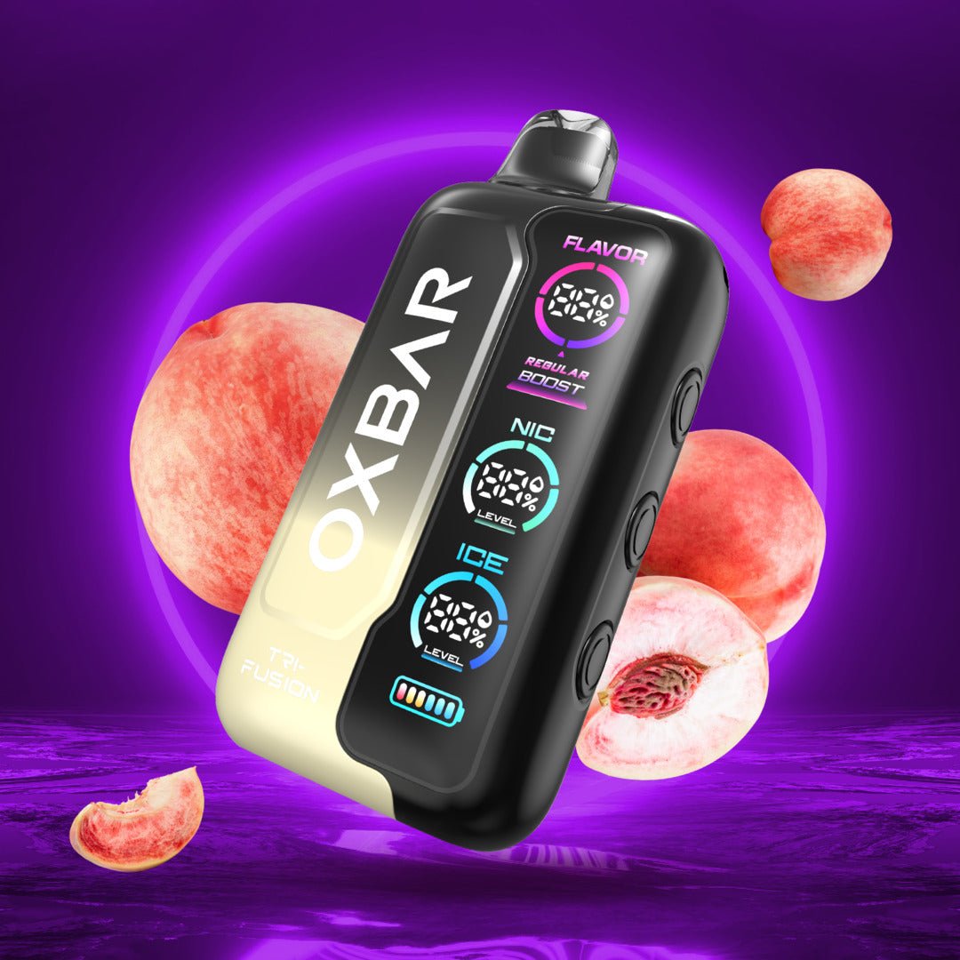 Oxbar Tri-Fusion 50K disposable vape in White Peach 5% with sleek design and clear branding, showcasing the product's flavor and packaging.