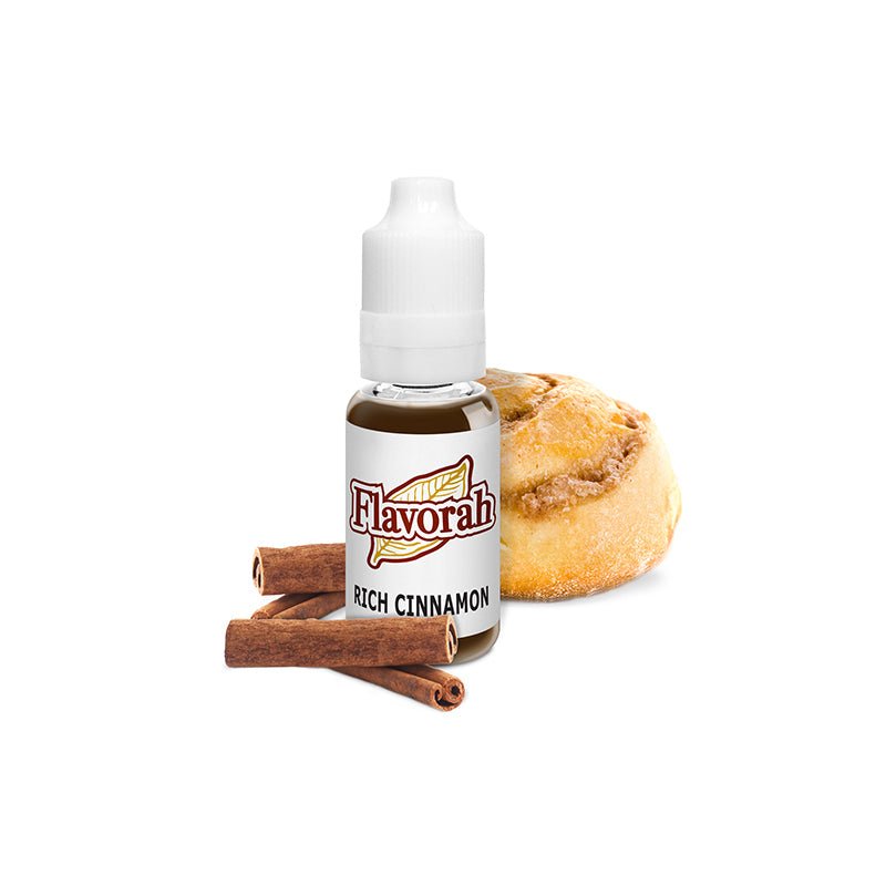 Container of Flavour World SA Rich Cinnamon flavoring with cinnamon sticks and powder in a clear jar.