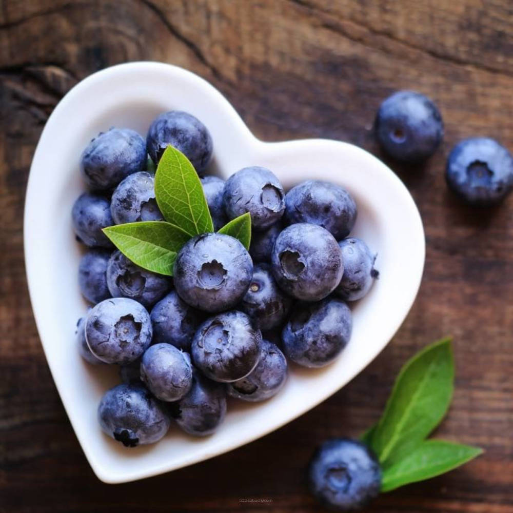 Fresh Blueberry SSA flavor by Flavour World SA, showcasing vibrant blueberries in a clear container.