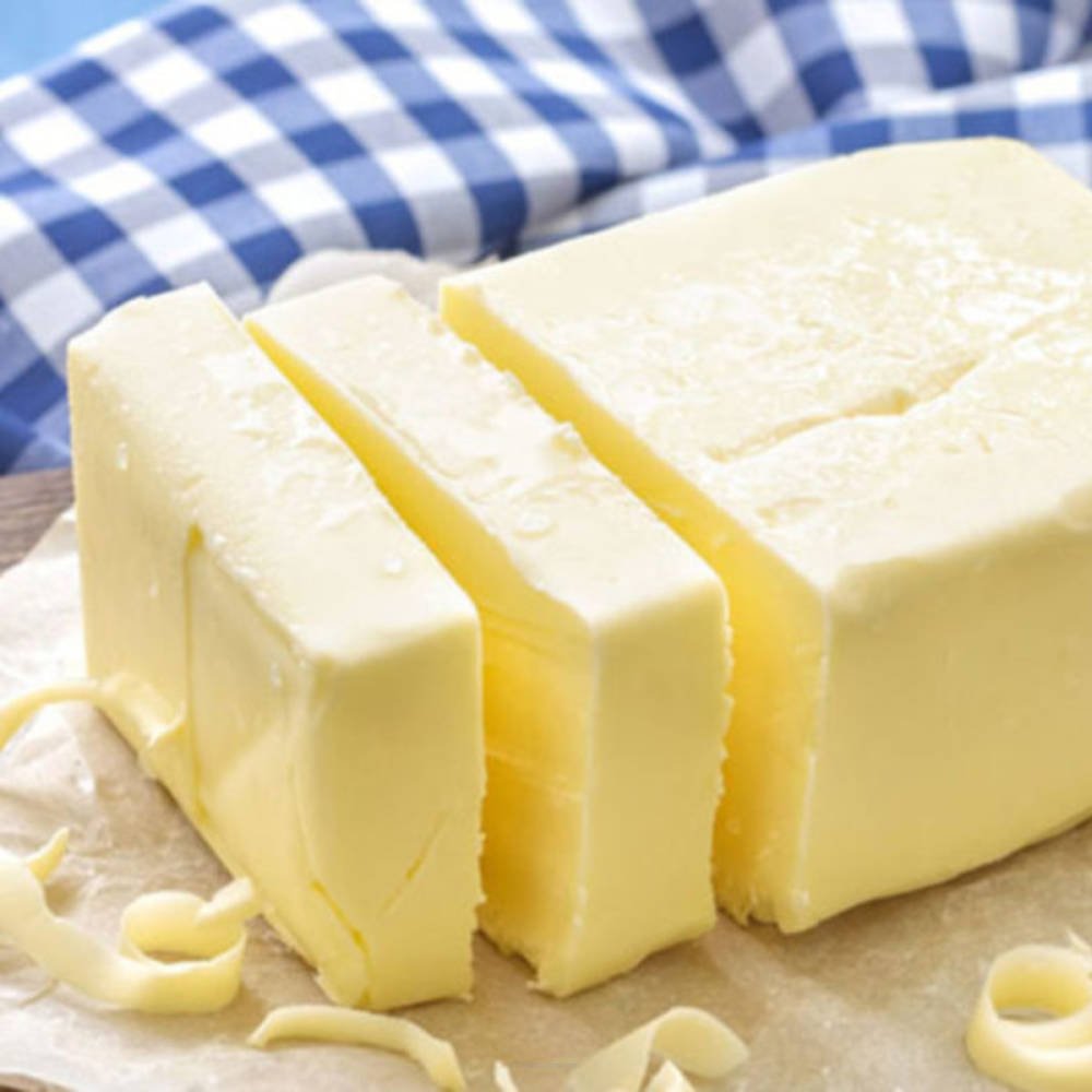 Creamy SSA butter from Flavour World SA in a smooth, golden block, ready for cooking or spreading.