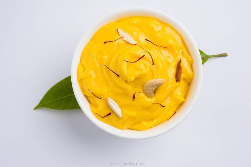 Canned SSA Mango Pulp by Flavour World SA in a sealed metal can with a bright label featuring mango images and product details.