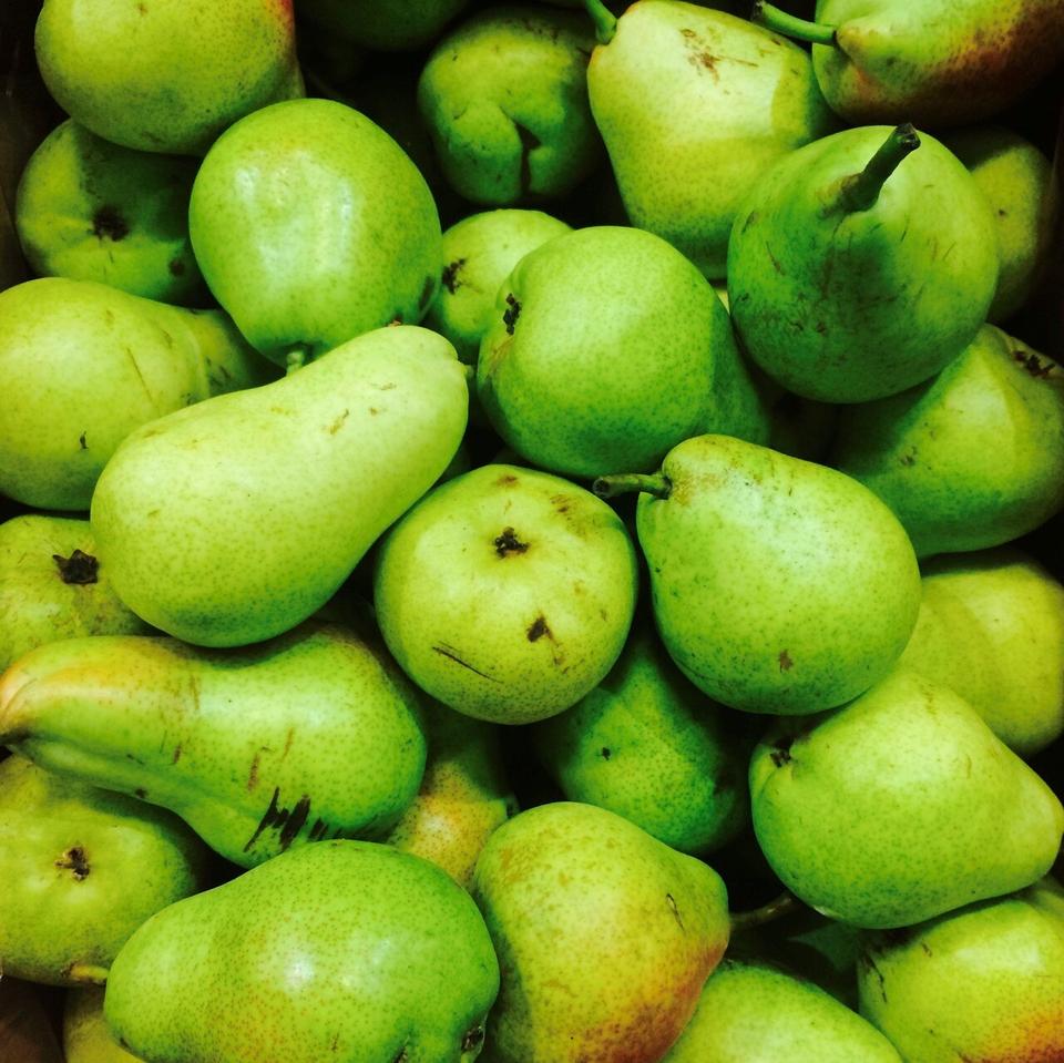 Fresh ripe pear from Flavour World SA, showcasing its smooth skin and natural shape, ready to enjoy.